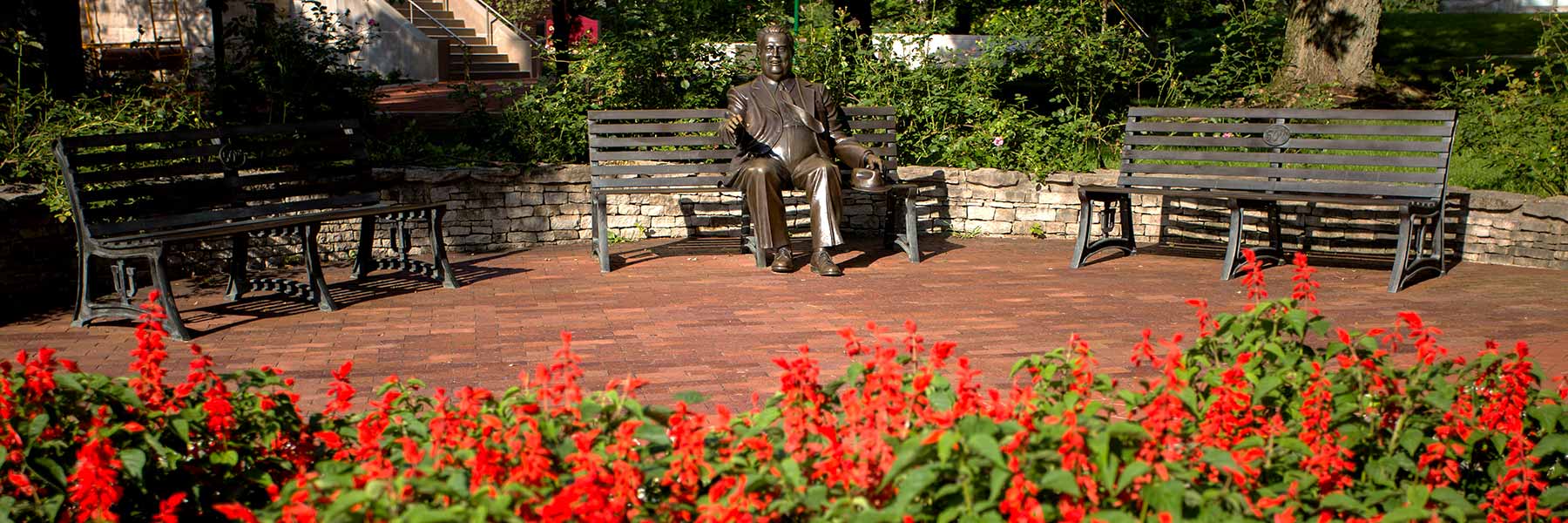 A bronze statue of Herman B Wells on the IU Bloomington campus